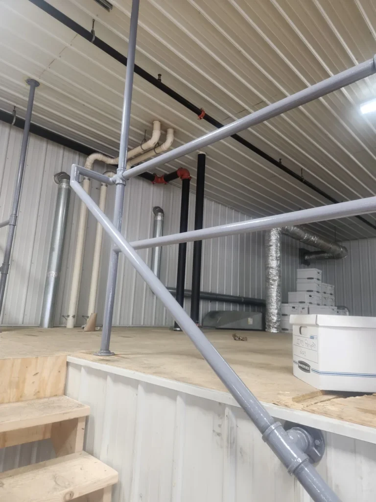Fabricated steel stair stringer and handrail