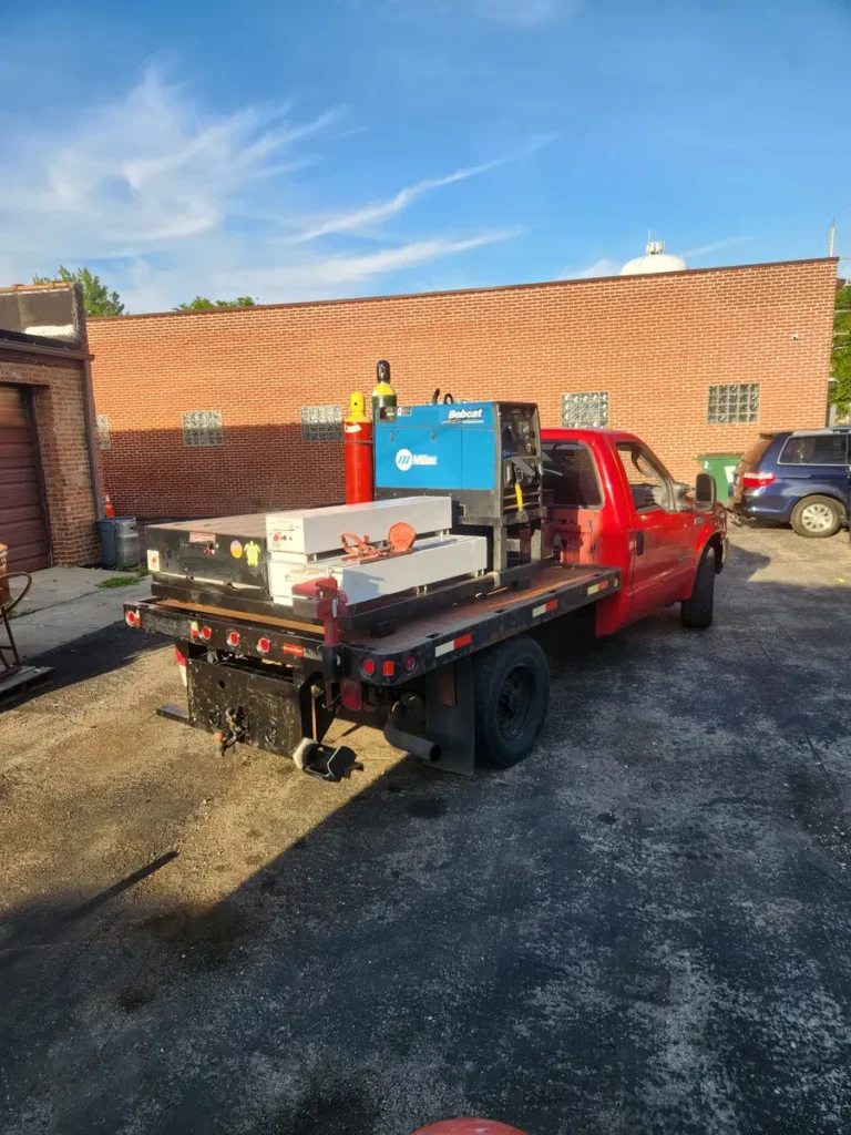 Mabutas mobile welding service truck with the welding rig on a job site in Villa Park, IL