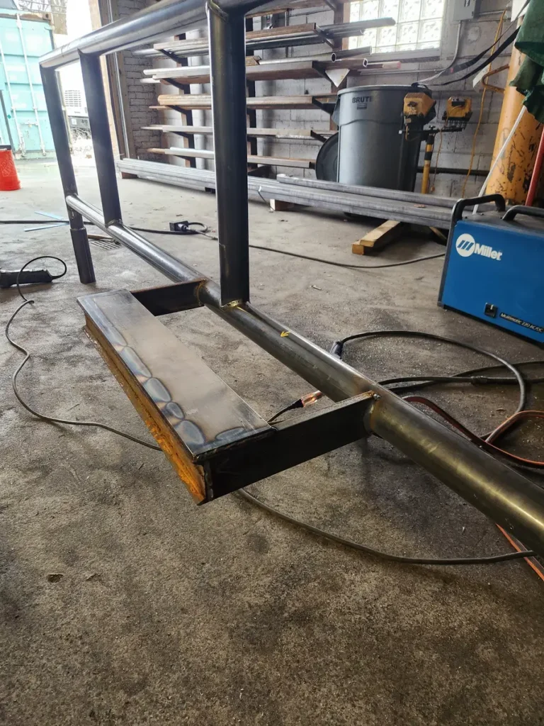 Vertical steel bar fence panel repaired in the shop