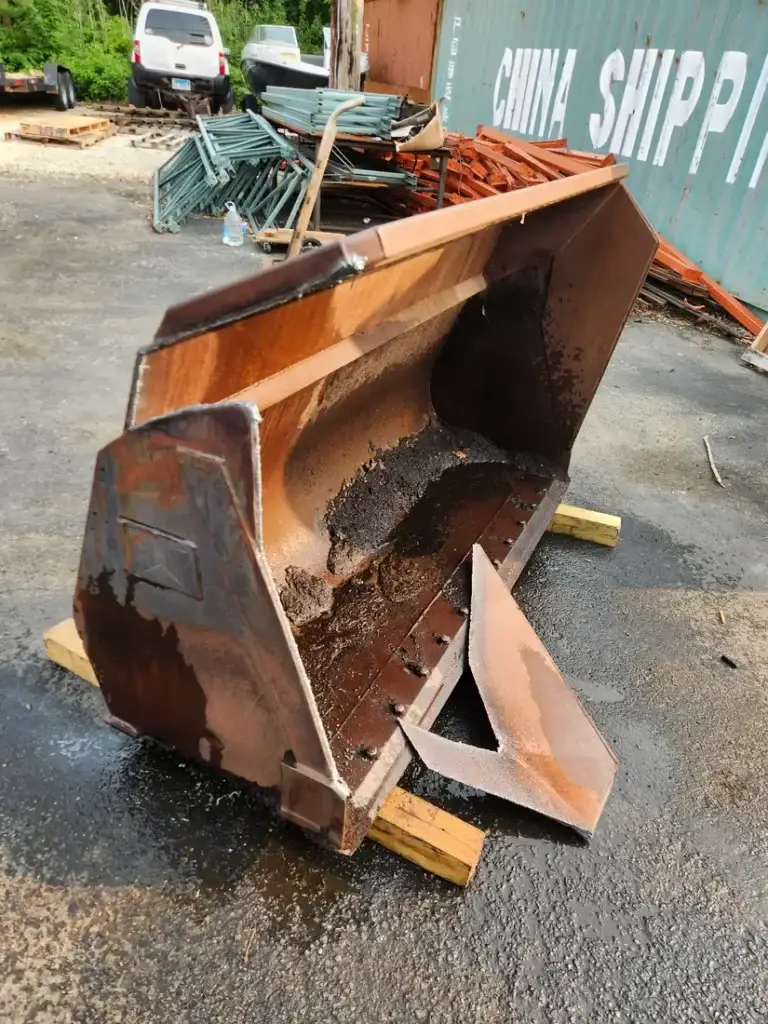 Excavator bucket rebuilt with new steel and welds