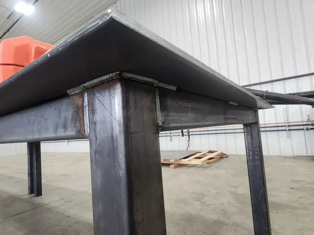 Heavy welded steel table frame from a custom fabrication job